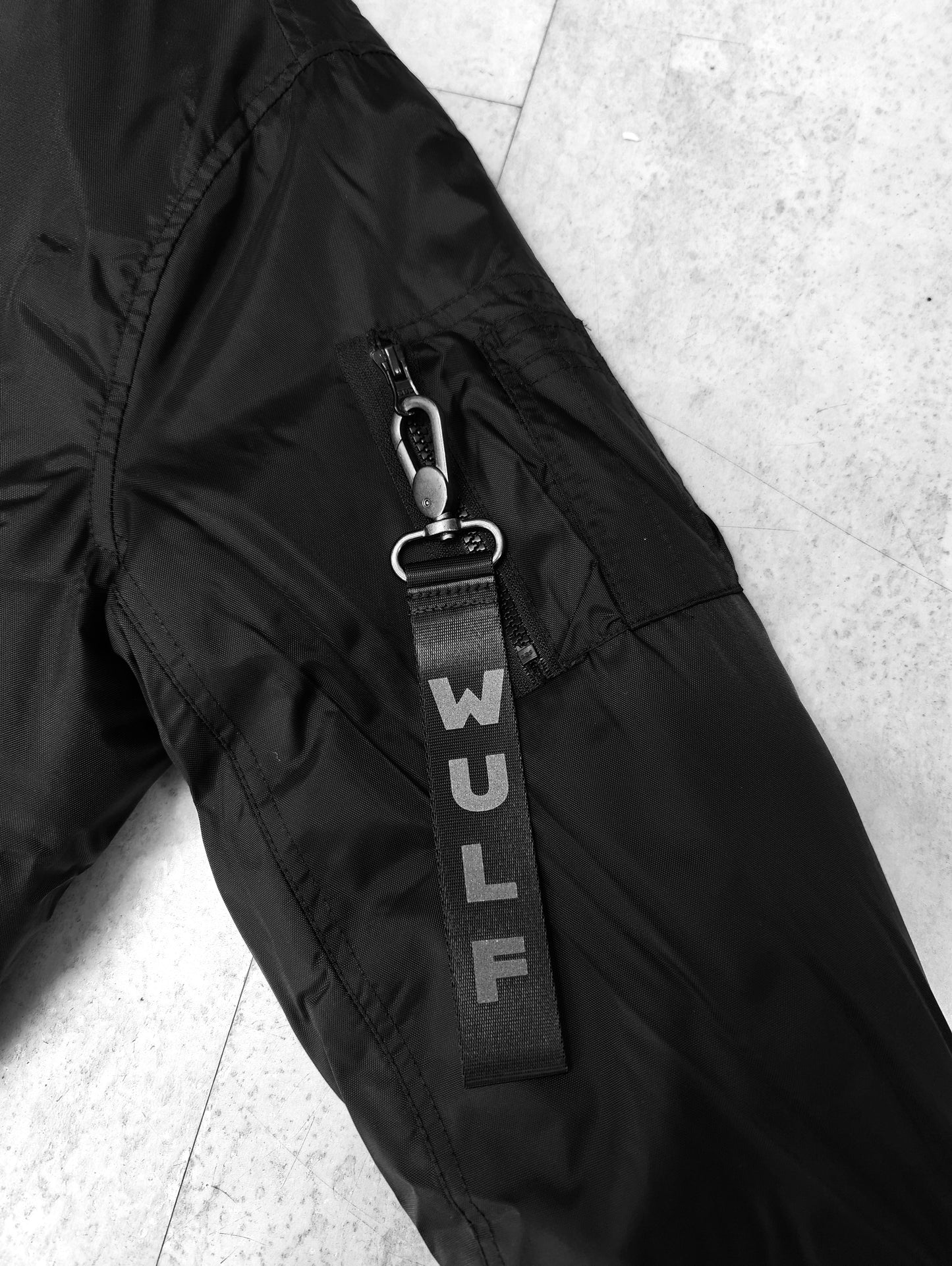 68°110 Black Reflective Bomber